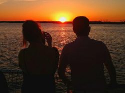 Guests enjoying an amazing sunset on Amelia Island