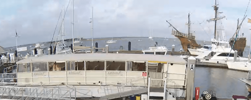 Trindad in port with Amelia River Cruises ' Bald Eagle