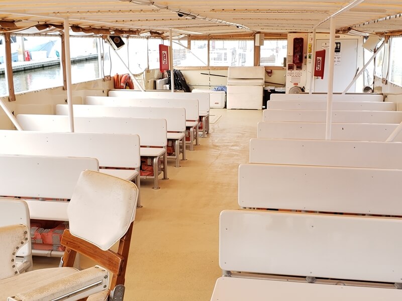 Interior seating area of a charter boat on Amelia Island