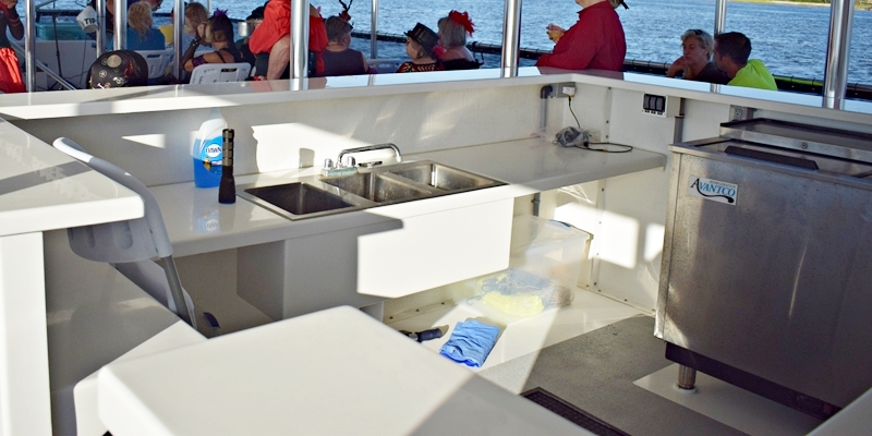 Three sink kitchen set up on a boat