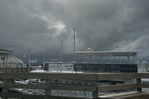 cloudy skies over a marina