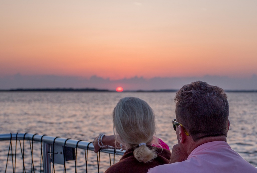 couple on a sunset river cruise