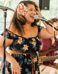 Kalani Rose is a singer and ukelele player in Fernandina on the Amelia River Cruise